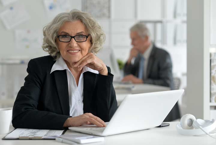 Women older working on laptop